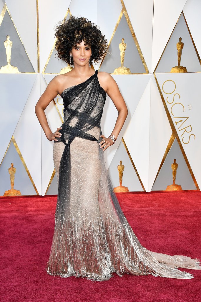 Halle Berry arrives in Versace on the Oscars red carpet for the 89th