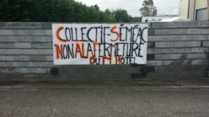 migrants hôtel mur