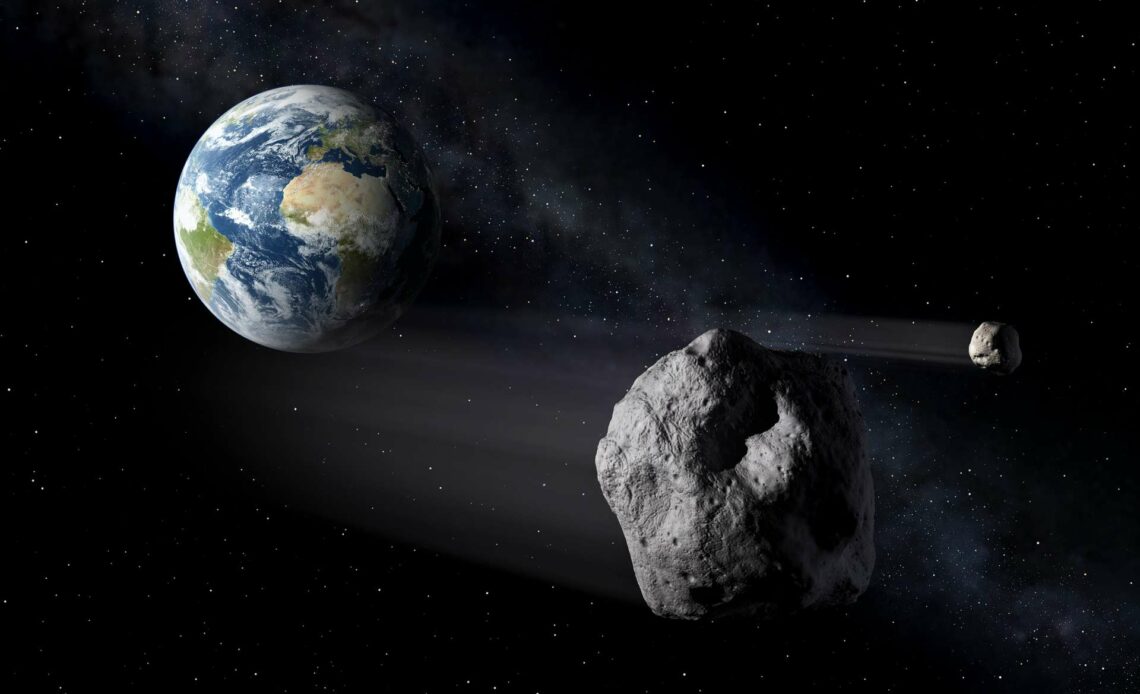 Photo d'un astéroïde et de la planète Terre