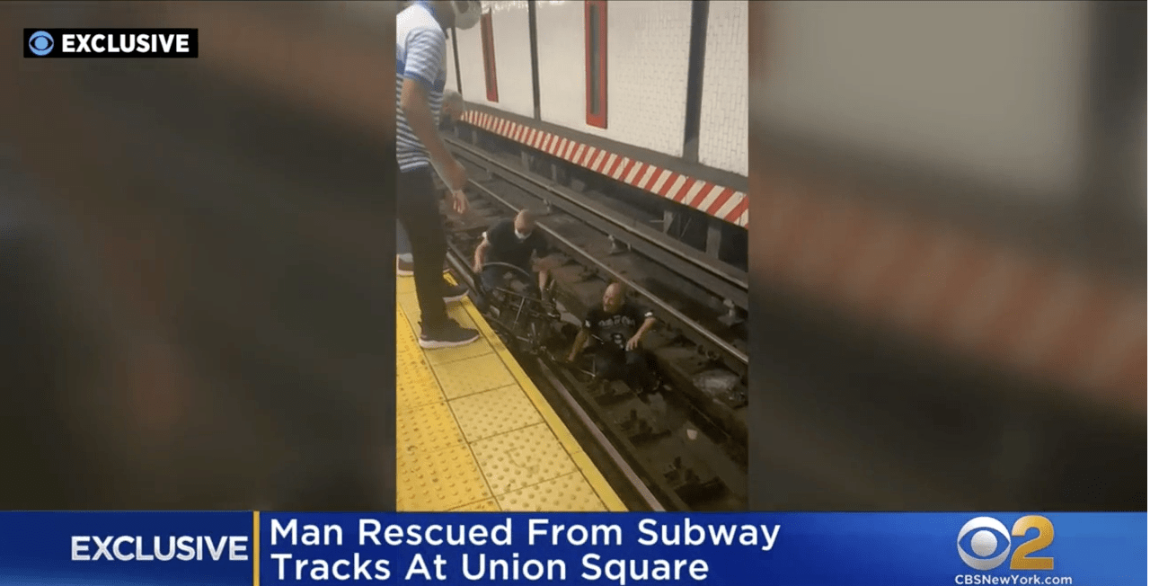 he barely saves a man in a wheelchair who fell on the metro tracks