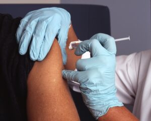 Suisse patron licencié prime non-vacciné